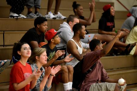 Students cheer on the Lady Bulldogs volleyball team as they compete against Harding University. - Photo by Anne Richoux