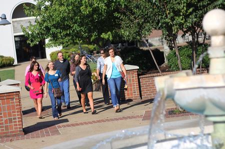 Savannah Hari, senior sports medicine major, gives a tour to prospective students and families during a preview day. - Photo by Matt McDaniel