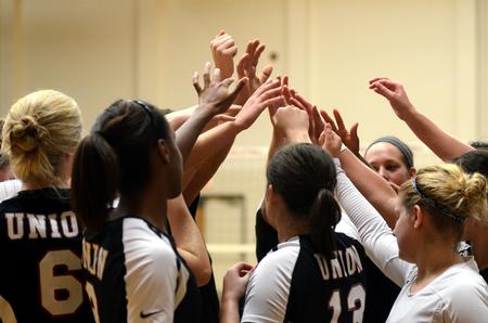The Lady Bulldogs huddle up during a game. - Photo by Amanda Rohde