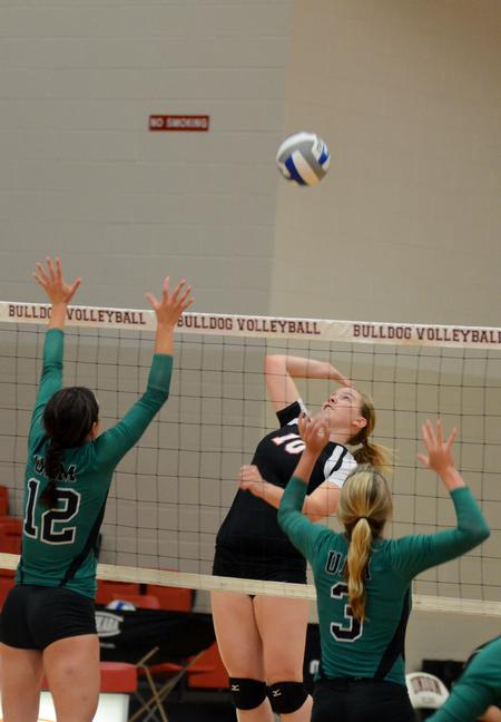 McKenna Carter spikes the ball against the University of Arkansas at Monticello during a match that the Lady Bulldogs won 3-1. - Photo by Amanda Rohde