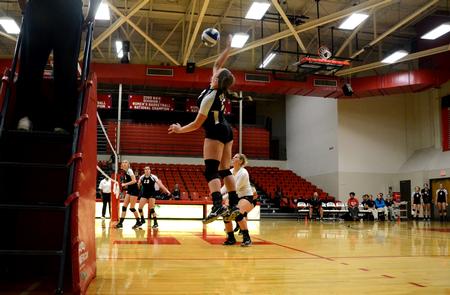 Lady Bulldog Savannah Hughes spikes the ball against the University of Arkansas at Monticello, September 21, 2013.  - Photo by Amanda Rohde