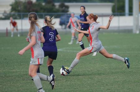 Kayleigh Patterson, freshman, takes a shot on goal in the game against the University of North Alabama lady Lions. - Photo by Matt McDaniel