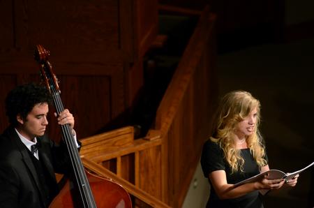 Madelyn Carson, senior music education major, performs a solo during a concert performance by the Union University Singers and Orchestra at First Baptist Church.  - Photo by Anne Richoux