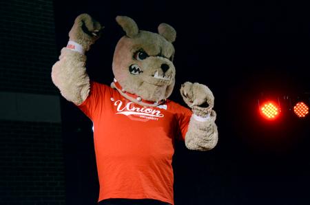 Buster the Bulldog leads the crowd in cheers when the NCAA logo is unveiled at Union Night. - Photo by Amanda Rohde