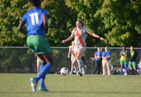 Lady Bulldog Hannah Miller, sophomore athletic training major, dribbles the ball down the field. - Photo by Amanda Rohde