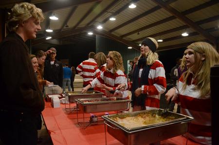 Student Activities Council members serve cobbler to students at the Casey Jones Hullabaloo.  - Photo by Anne Richoux