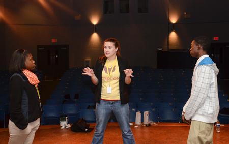 Leanna Cargile, senior theatre/speech major, walks students through an improve exercise during Campus and Community: A Day of Remembrance and Service.  - Photo by Jacob Moore