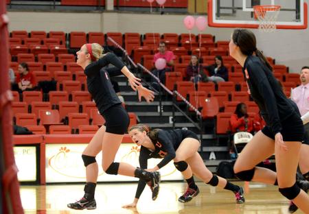 Lady Bulldogs Mallory Baker, Erin Hennesy, and Abbey Wainwright rush towards the ball during a game against Trevecca Nazarene University at the Fred DeLay Gymnasium. Union won 3-2.  - Photo by Anne Richoux