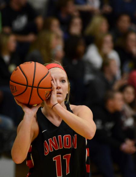 Emily Sissom, junior special education major, prepares to shoot during a 3-point contest during Bulldog Madness in the Fred DeLay Gymnasium. - Photo by Jacob Moore