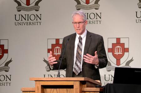 Russ Howell, professor of mathematics at Westmont College, speaks as a part of the Aslan's Apologist Town & Gown lecture series in the Carl Grant Events Center.  - Photo by Anne Richoux