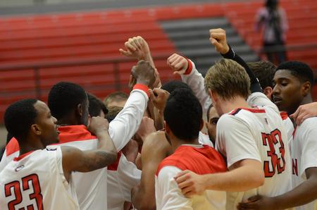 The Union University Bulldogs huddle up before a game against the  Central Baptist College Mustangs. - Photo by Matt McDaniel