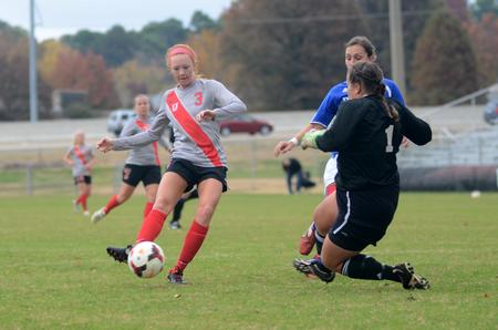 Lady Bulldog Kayleigh Patterson, freshman broadcast journalism major, takes a shot on goal. - Photo by Amanda Rohde