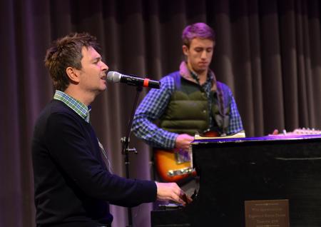 Travis Cottrell, worship pastor at Englewood Baptist Church, leads students and faculty in a time of worship and praise in chapel. - Photo by Amanda Rohde