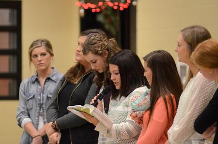 Members of Zeta Tau Alpha read scripture as a part of A Panhellenic Christmas in the Bowld Student Commons.  - Photo by Anne Richoux