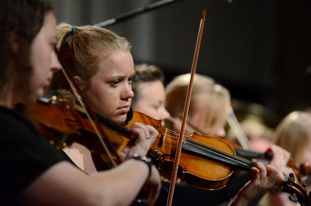 Audrey Hazlehurst performs with the University Symphony during the annual "A Union Christmas" in the G.M. Savage Memorial Chapel.  - Photo by Anne Richoux
