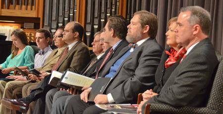 Participants in a chapel program sit on stage during the celebration and thanksgiving service for David and Lanese Dockery - Photo by Morris Abernathy