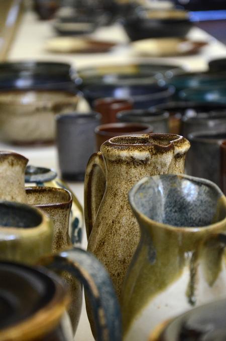 Students, faculty, and members of the community gathered in the Student Union Building hallway to shop the annual Christmas Pottery Sale presented by the Potter's Guild. The sale features pottery and crafts by students and faculty of the art department.  - Photo by Amanda Rohde