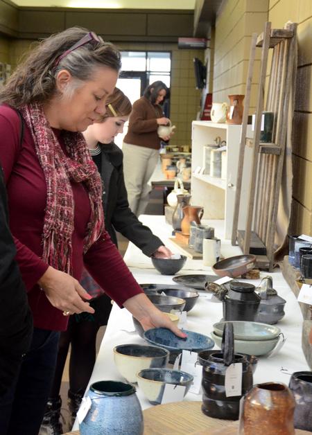 The Annual Christmas Pottery Sale is open to the public, and many members of the community come as well to support student artists and purchase handmade pieces. - Photo by Amanda Rohde