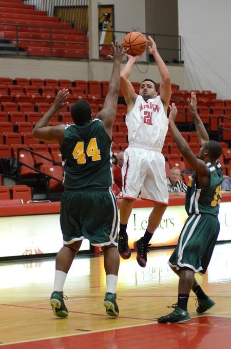 Bulldog Pedro Faller makes a shot during a game against Concordia College. The Bulldogs won 88-79.  - Photo by Anne Richoux