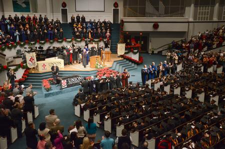 Faculty, families, and friends give the 189th graduating class a standing ovation following the conferring of degrees and presentation of diplomas at the Fall Commencement Services. - Photo by Amanda Rohde