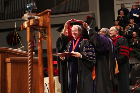 President Dockery receives his honorary doctoral hood