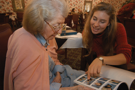 Senior Laura Lee Moore volunteers at MorningSide during Day of Remembrance 2003. - Photo by Justin Veneman