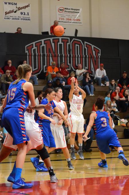 Lady Bulldog LaTesa McLaughlin shoots a three pointer against University of West Georgia. Union won the game 63-55.  - Photo by Anne Richoux