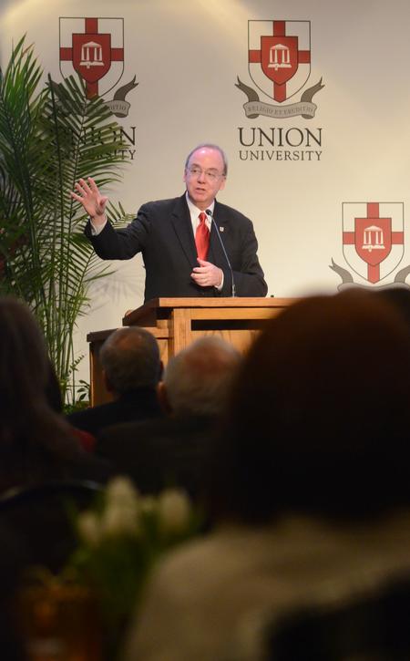 David S. Dockery, president of the university, introduces the speakers at the West Tennessee Ministers and Wives Valentine's Banquet in the Carl Grant Events Center. - Photo by Amanda Rohde
