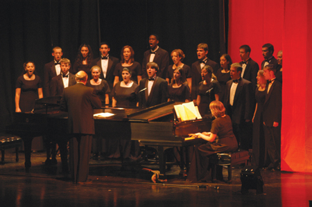 Dr. Richard Joiner led Proclamation in song to kick off the 2003 Scholarship Banquet.  - Photo by Jonathan Blair