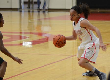 LaTesa McLaughlin jukes the defender during the Lady Bulldogs game against the Delta State Lady University Lady Statesmen during homecoming weekend in the Fred DeLay Gymnasium. - Photo by Matt McDaniel