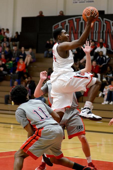 Bulldog Ashanti Day goes up for a layup during a game against Christian Brothers University in the Fred DeLay Gymnasium.  - Photo by Anne Richoux