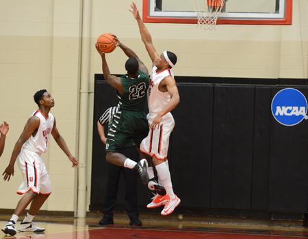 Bulldog AJ Roberts plays defense against Delta State during the homecoming game in the Fred DeLay Gymnasium.  - Photo by Anne Richoux