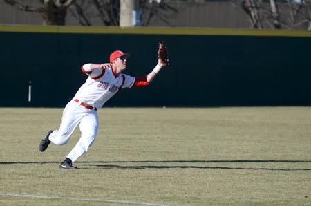 Bulldog Wacey Russell catches a ball in the outfield during a game against Southern Arkansas University.  - Photo by Anne Richoux