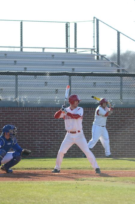 Bulldog Brad Royer prepares for a pitch from a Southern Arkansas University player.  - Photo by Anne Richoux