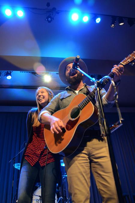 Katie Longworth, junior nursing major, poses with Drew Holcomb after singing onstage with the Nashville-based band during the Student Activities Council sponsored spring concert. - Photo by Amanda Rohde