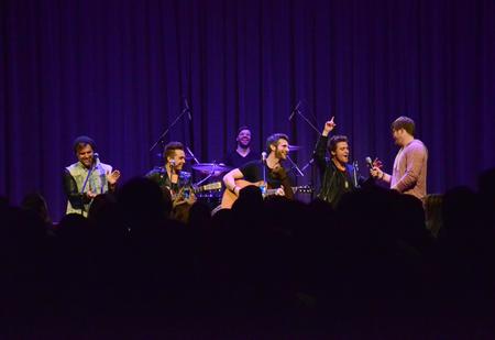 Anthem Lights pulls a fan onstage to finish their "Best of 2012 Pop Mash-Up" as they perform at the annual SAC spring concert.   - Photo by MiKalla Cotton