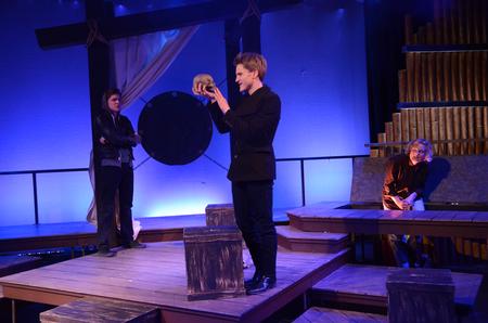 William Burke, senior music theory major, performs the iconic scene with Yorick's skull in Shakespeare's "Hamlet" presented by The Union Players.  - Photo by Amanda Rohde