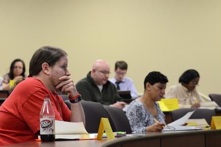 Students and guests listen during the "Bach as Theologian in his Sacred Cantatas" Town and Gown lecture series in Providence Hall.  - Photo by Anne Richoux