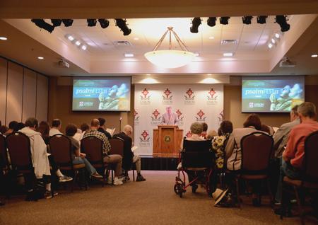 Todd Brady, vice president for university ministries, reads scripture during PsalmFest II in the Carl Grant Events Center. - Photo by Amanda Rohde