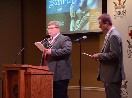 Adam Stanford, senior church music major, and Chris Mathews, associate professor of music and department chair, lead singing during PsalmFest II in the Carl Grant Events Center. - Photo by Amanda Rohde