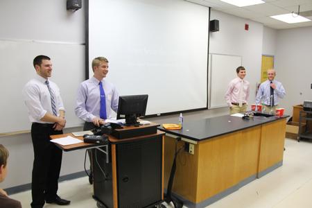Dylan Baker, Cody Giles, Todd Jones, and Kian Jost, senior engineering majors, present their project for the Scholarship Symposium. - Photo by Matt McDaniel