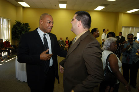Charles Clark Jr., adjunct education instructor, talks with Dr. Charles Fowler, senior vice president for university relations, at the August graduation reception. Clark was among Union's first doctoral graduates to be conferred degrees in the August ceremony. - Photo by Morris Abernathy