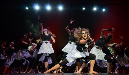 Members of Zeta Tau Alpha throw their hands out during a dance routine in their performance at the 17th annual Variety Show. - Photo by Jacob Moore