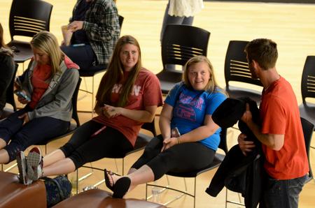 Students chat and laugh together before the start of the Movie in the Bowld hosted by Student Activities Council.  - Photo by Anne Richoux