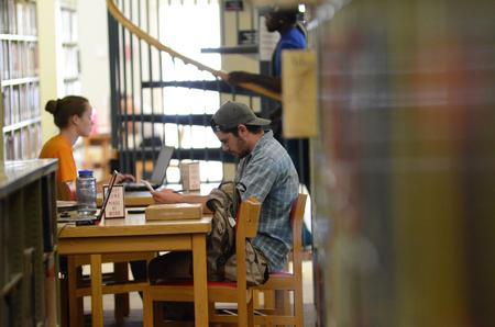 Students study in the library during finals week.  - Photo by Anne Richoux