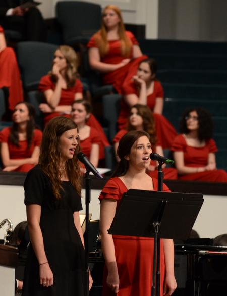 Catherine Guthrie, freshman music education major, and Hannah McIntosh, sophomore English major, perform "For Good" at the benefit concert for the Olivia Greenlee Memorial Scholarship. - Photo by Jacob Moore