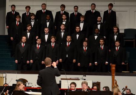 The men's choir performs at the benefit concert at West Jackson Baptist Church for the Olivia Greenlee Memorial Scholarship. - Photo by Jacob Moore