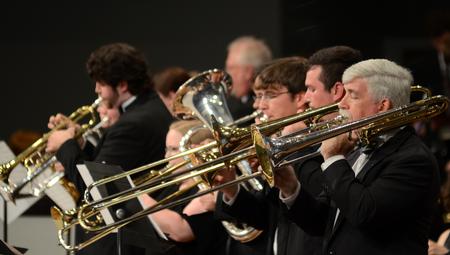 Bill Nettles, right, physics department chair, performs with the Jazz Band during a benefit concert at West Jackson Baptist Church to support the Olivia Greenlee Memorial Scholarship. - Photo by Jacob Moore