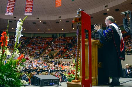 David S. Dockery makes his closing remarks to the 630 graduates and their guests. He wears his newly given academic doctoral hood to be "one" with the Union University community. - Photo by Kathleen Murray