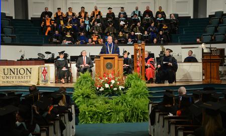 Dr. Samuel W. Dub Oliver greets those attending the summer commencement for Union University. - Photo by Morris Abernathy